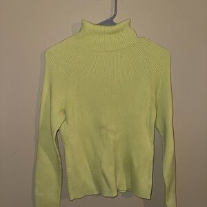 Green turtleneck sweater!